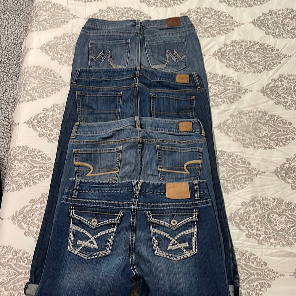 4 pairs of gently worn jeans. 2 American Eagle, 1 Amethyst, 1 Maurices.